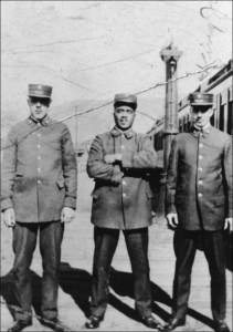 Three railway porters posing in Toronto, Ontario in 1925.