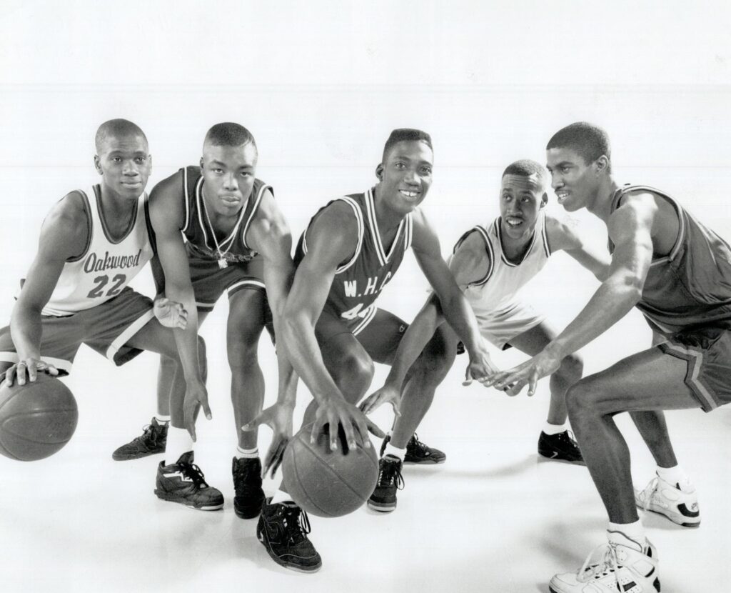 Photograph of high school basketball players from Oakwood, West Hill, and Eastern Commerce among other posing for the Toronto Star. Photograph taken by Ron Bull and sourced from Digital Archive Ontario.