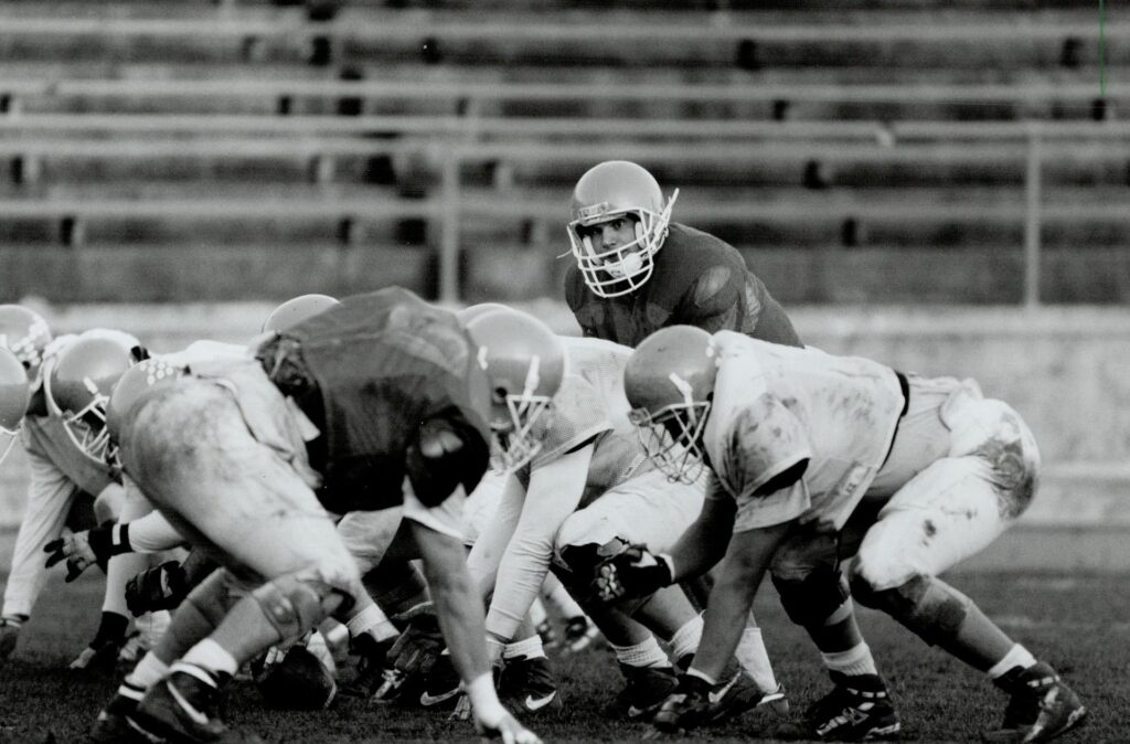A photograph of the University of Toronto Varsity Blues practicing for the Vanier Cup on November 18, 1993. Photographed by Rick Eglinton and sourced from the Toronto Public Library.