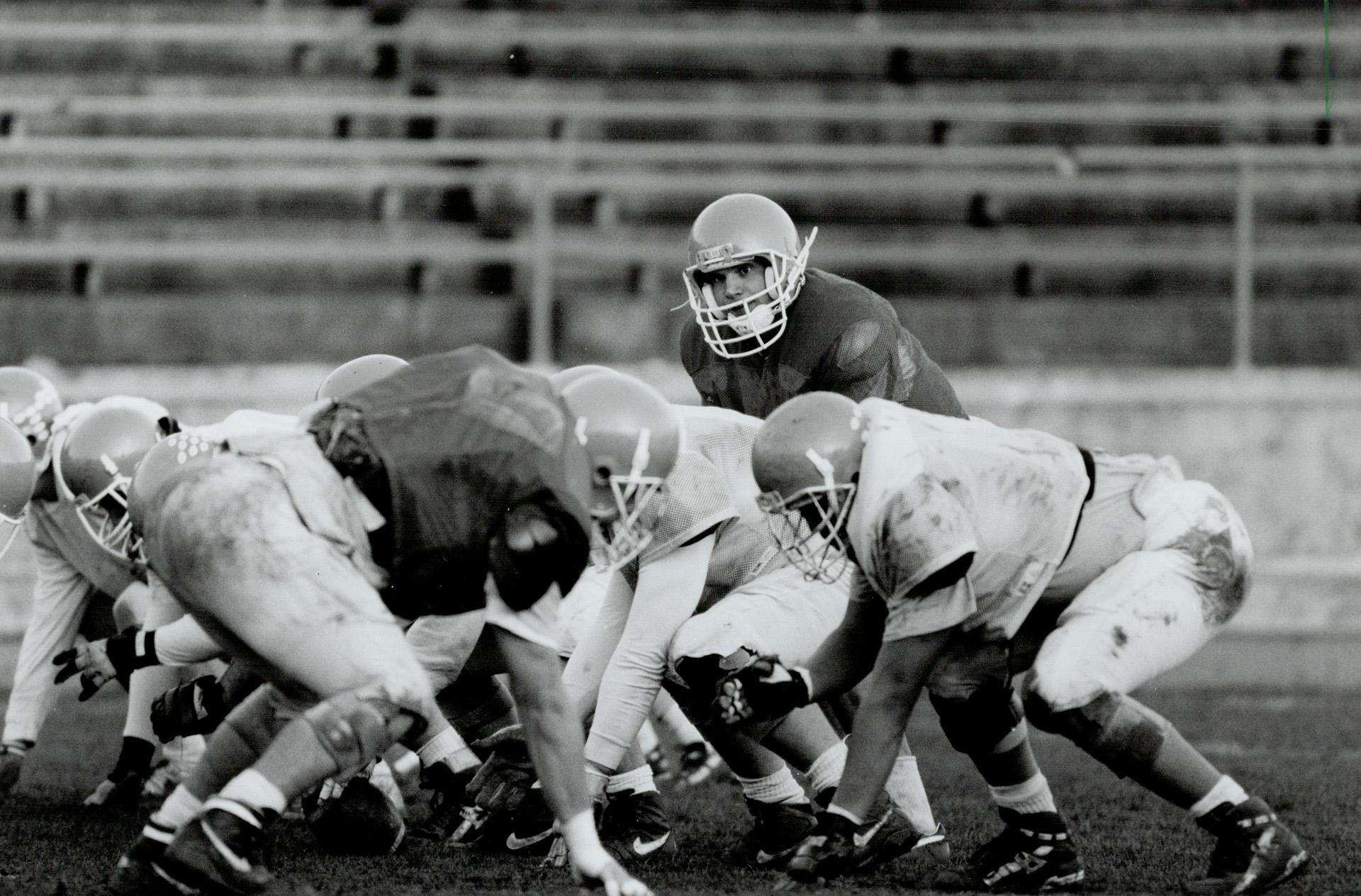 A photograph of the University of Toronto Varsity Blues practicing for the Vanier Cup on November 18, 1993. Photographed by Rick Eglinton and sourced from the Toronto Public Library.