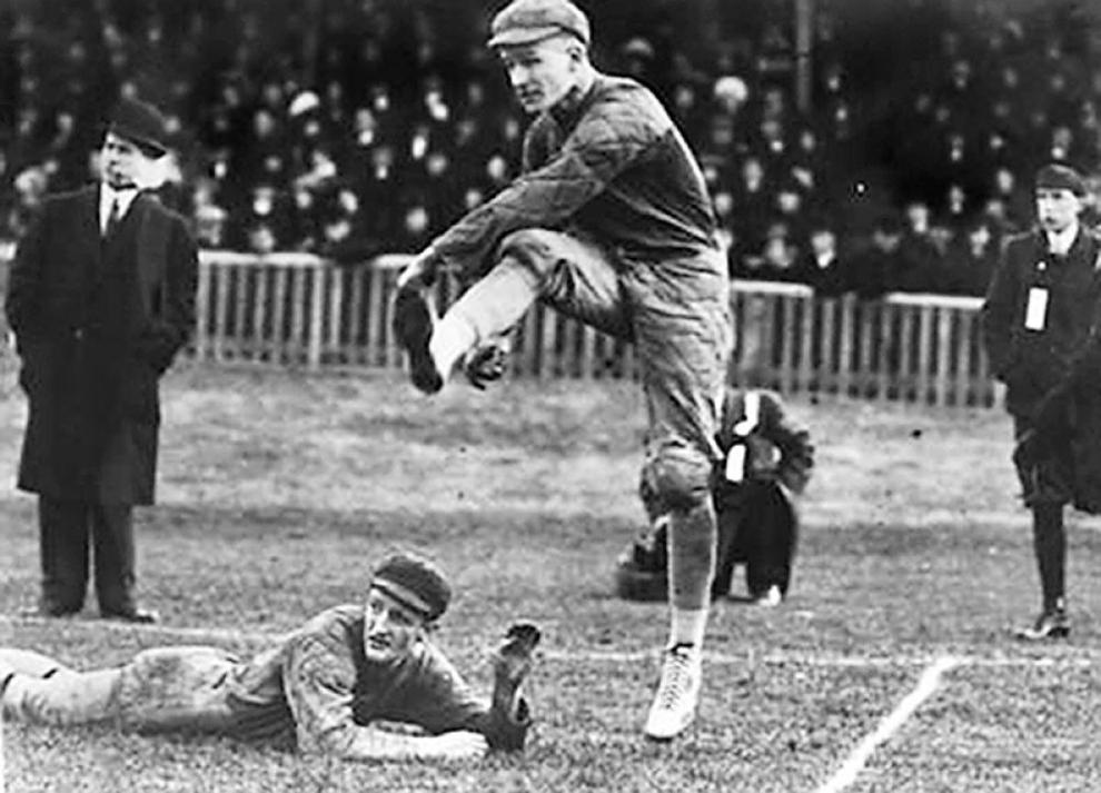 A photograph of Parkdale Collegiate's Hugh Gall kicking off during the second Grey Cup championship in 1910. Image sourced from The Canadian Football Hall of Fame.