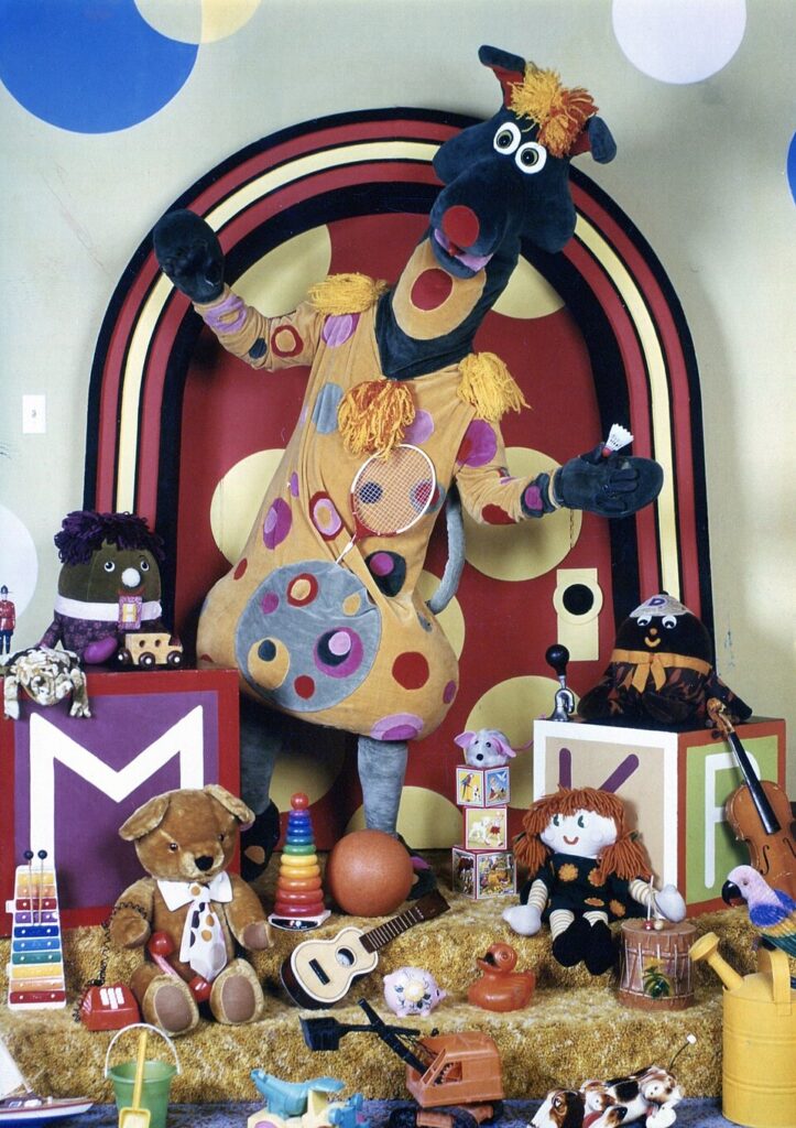 Polkaroo standing in front of the Polka Dot Door, started in Fall 1971 on TVO.