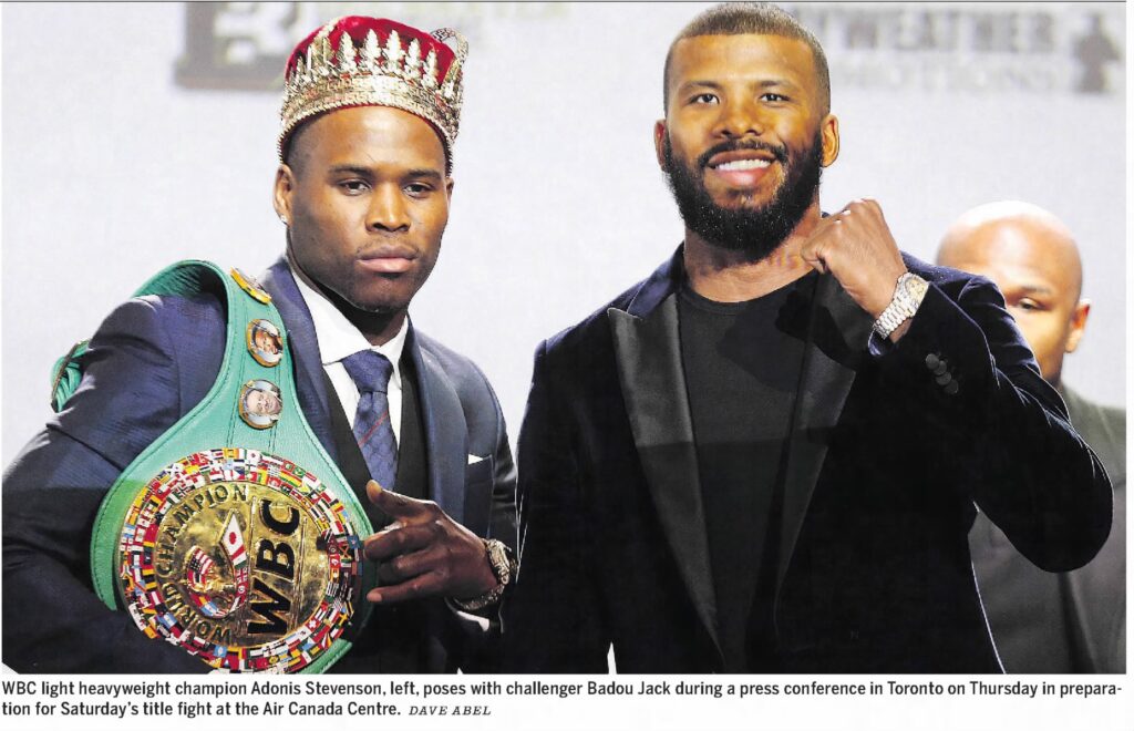 A photograph of boxers Adonis Stevenson and Badou Jack preparing for their upcoming fight, as published in The Gazette on May 18, 2018. Image taken by Dave Abel and sourced from Newspapers.com.