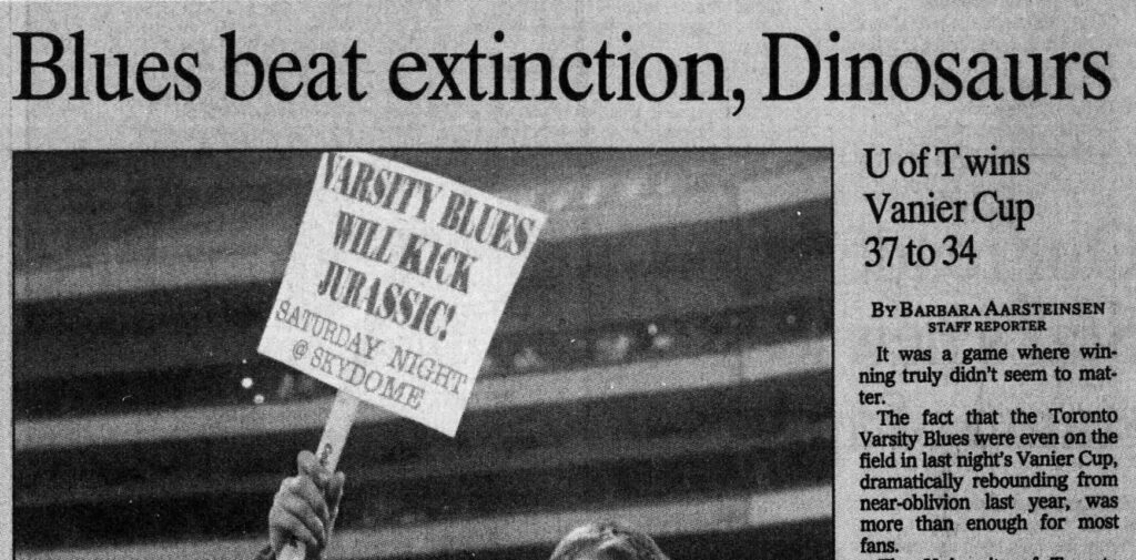 An article excerpt from the Toronto Star with the headline, "Blues beat extinction, Dinosaurs," published on November 21, 1993. The article describes the victory of the University of Toronto Varsity Blue's college football team beating Calgary Dinosaurs following a year where the team was at risk of being disbanded. Article written by Barabara Aarsteinsen, photograph by Tony bock, and sourced from Newspapers.com.